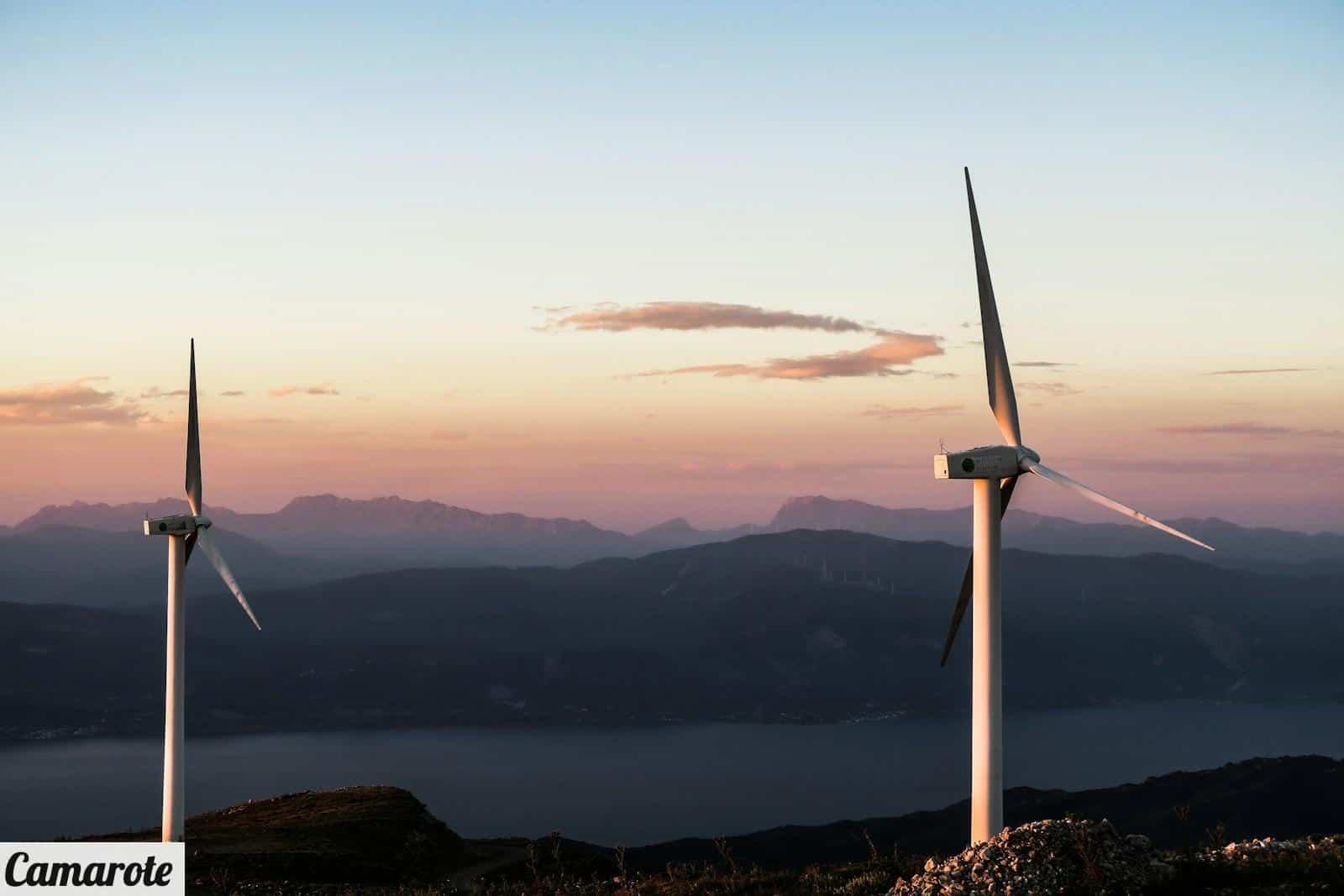 two white wind turbines