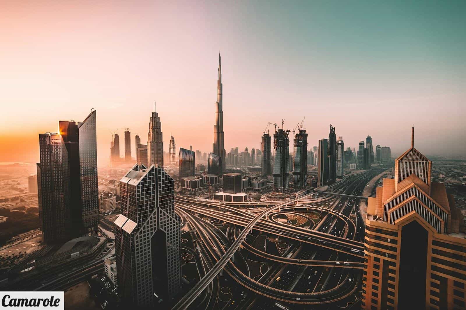 aerial photo of city highway surrounded by high-rise buildings